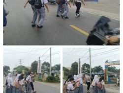 Pengaturan Lalu-lintas pagi hari memberikan pelayanan kepada anak-anak Sekolah dan masyarakat Pengguna Jalan.
